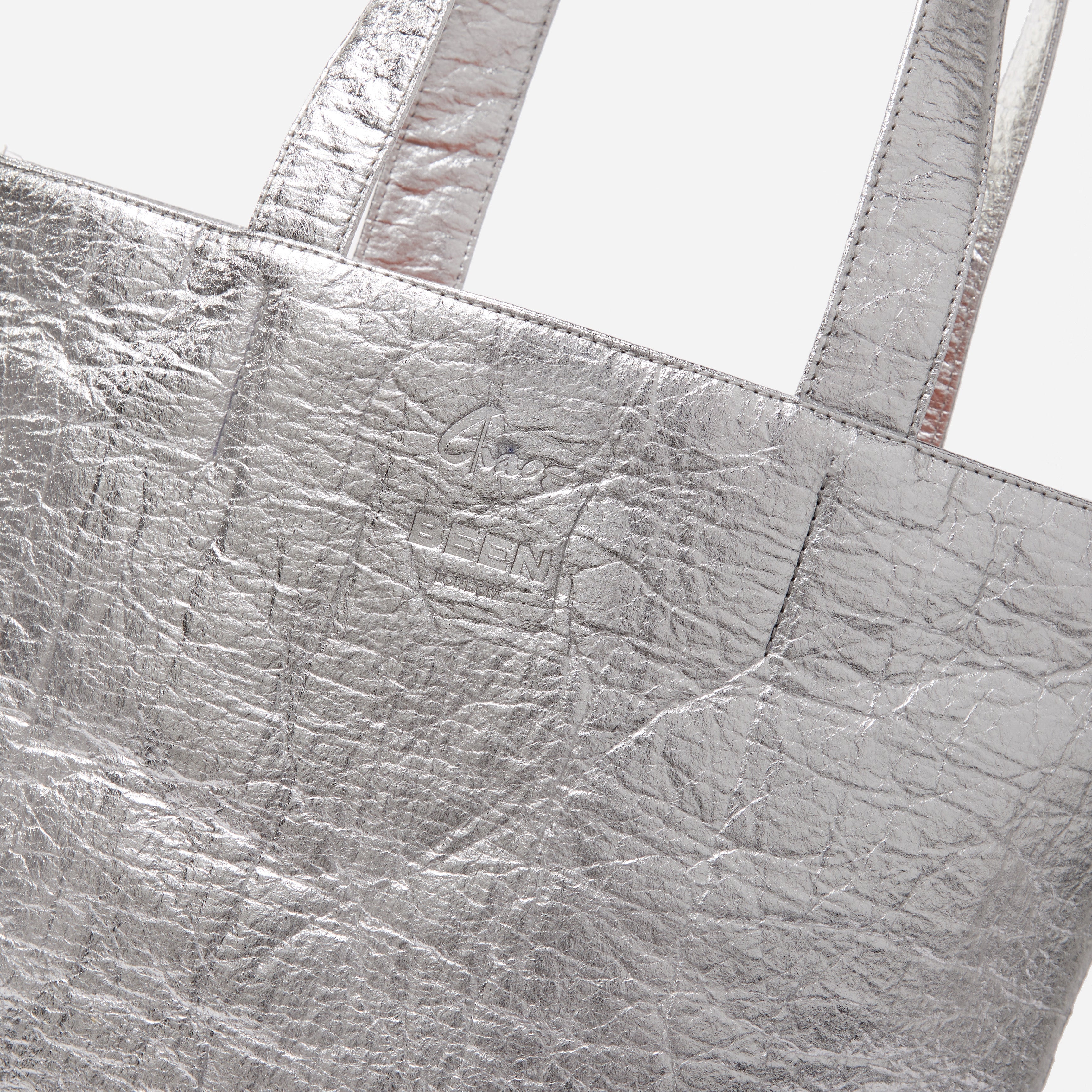 Chaos & Colour Tote in platinum close up front view