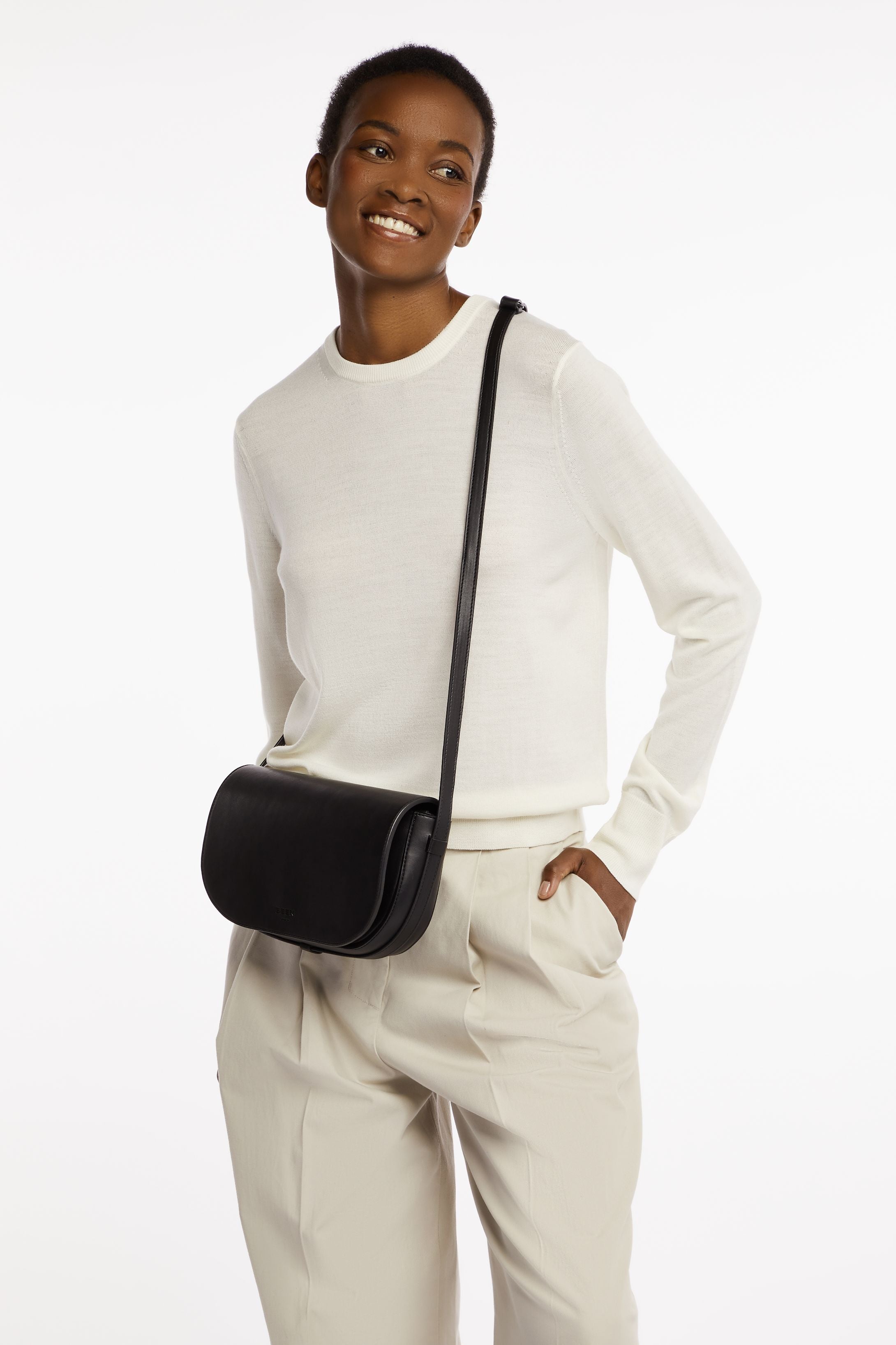 Millais Bag in Black Onyx on model as cross body sling