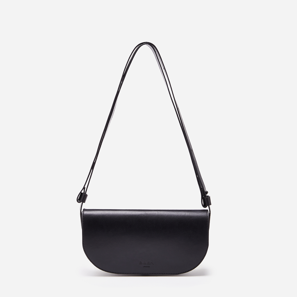 Our Mini Millais bag in Vegan Appleskin leather alternative on shortest strap to show it can be worn as a shoulder bag