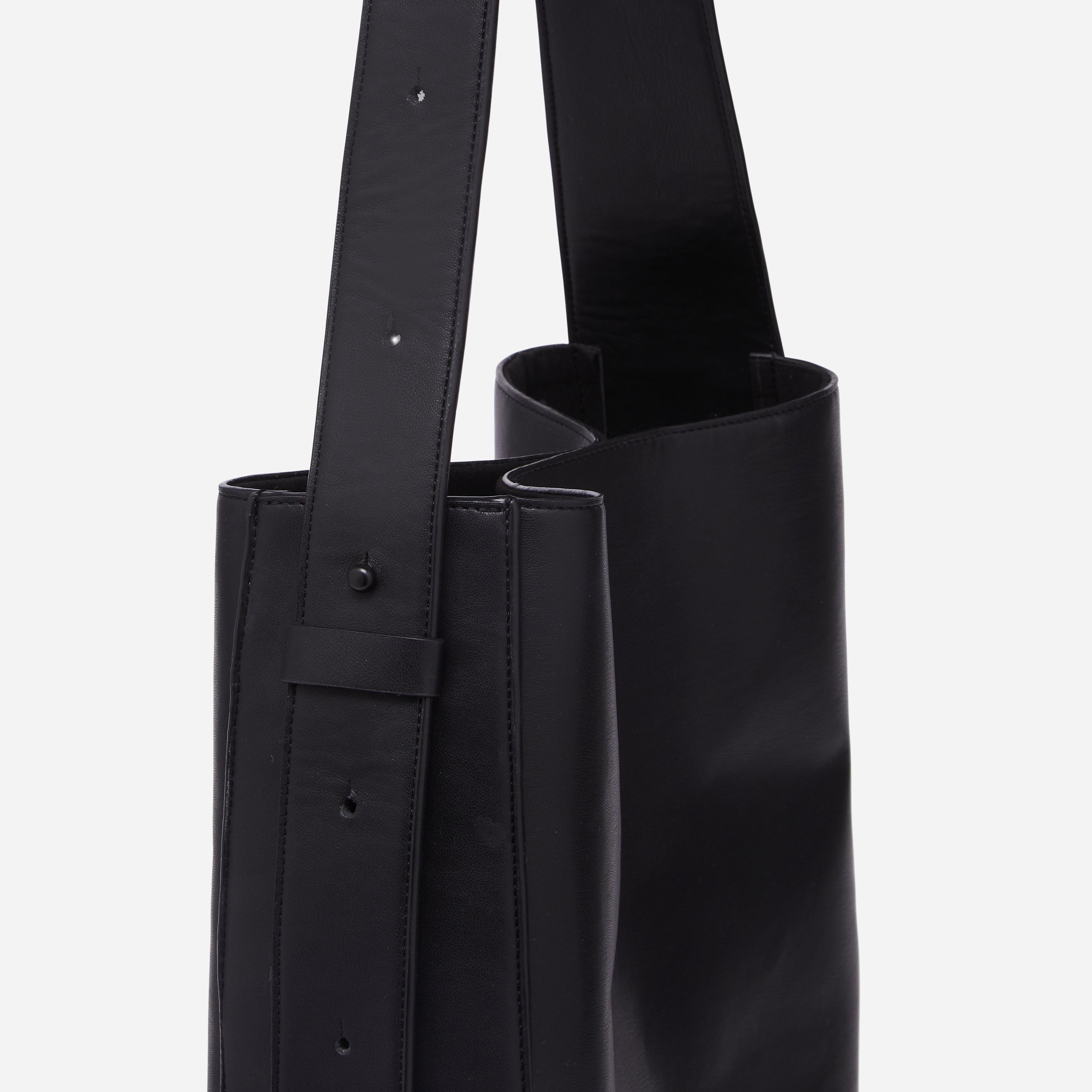 Rowe Tote in Black Onyx  side view of the adjustable strap