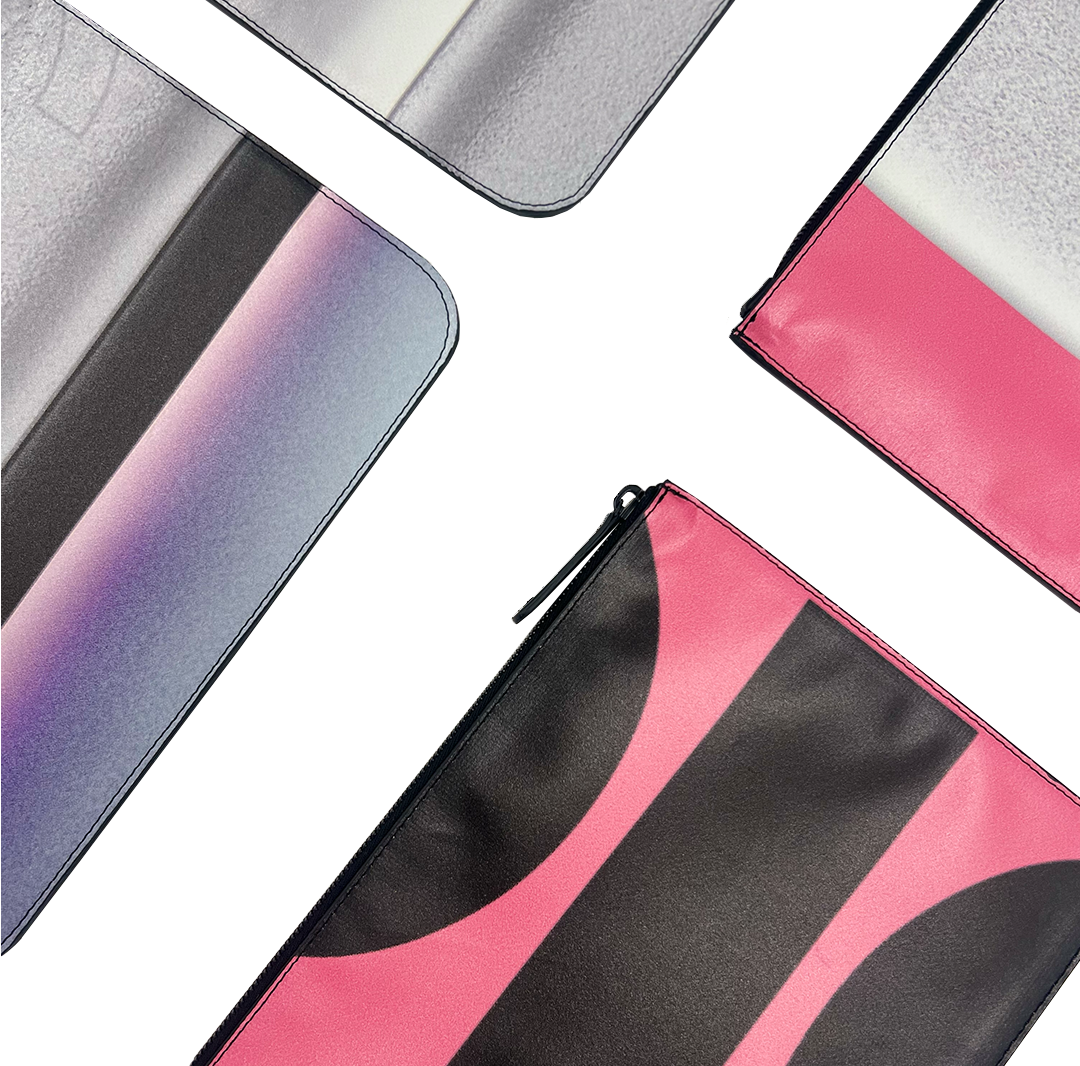 Collection of colorful pouches on a white background