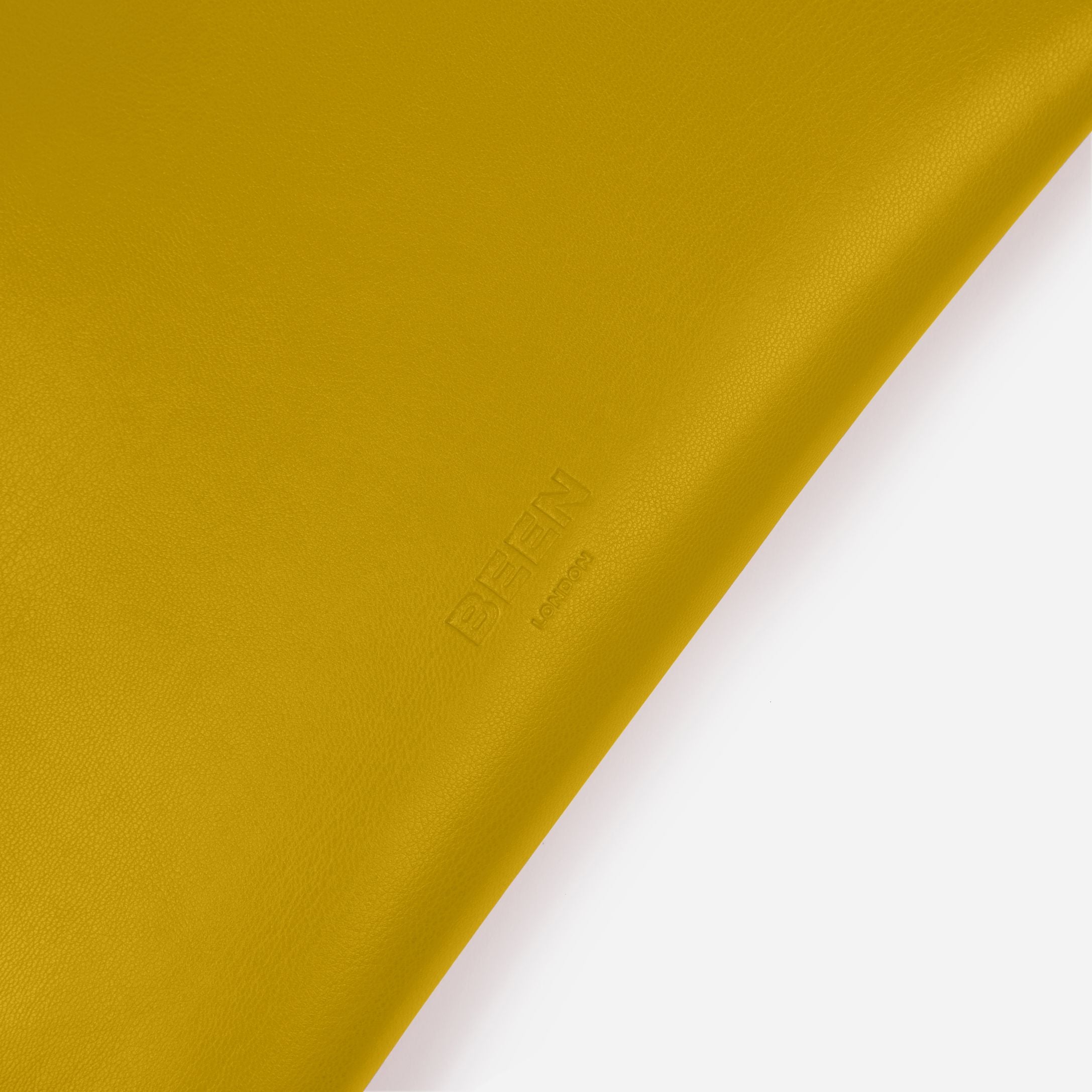 Yael Clutch bag- Medium Pouch in Zest logo close up 