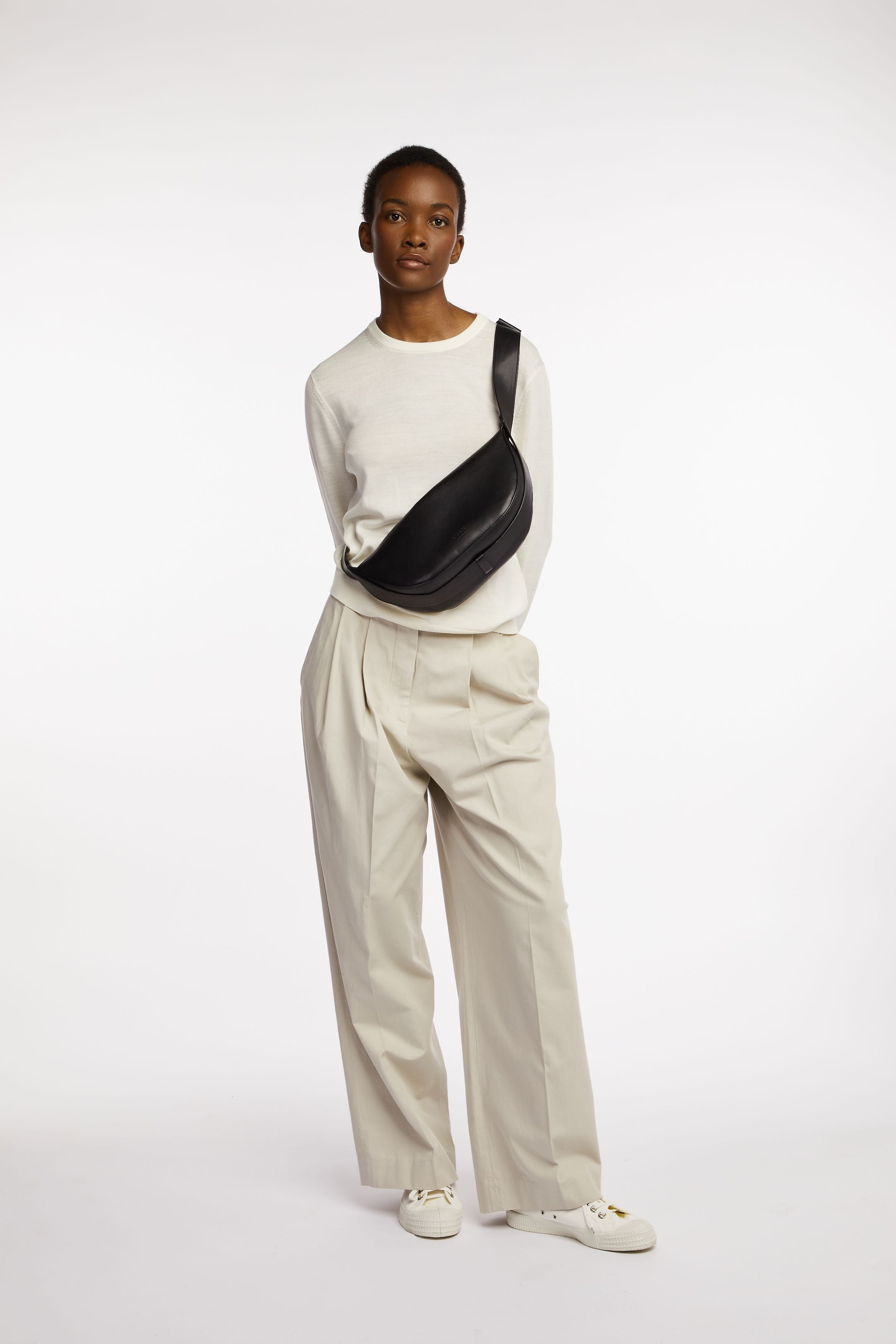 Black Onyx Annis Sling Bag on model as a sling/ crossbody bag