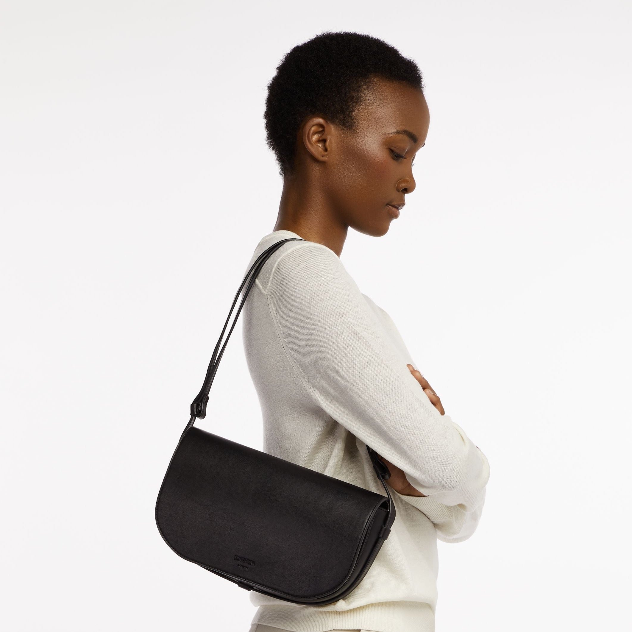 Millais Bag in Black Onyx on model as shoulder bag
